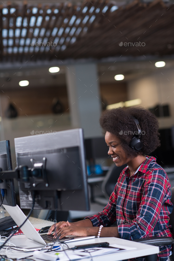 portrait of a young successful African-American woman in modern - Stock Photo - Images