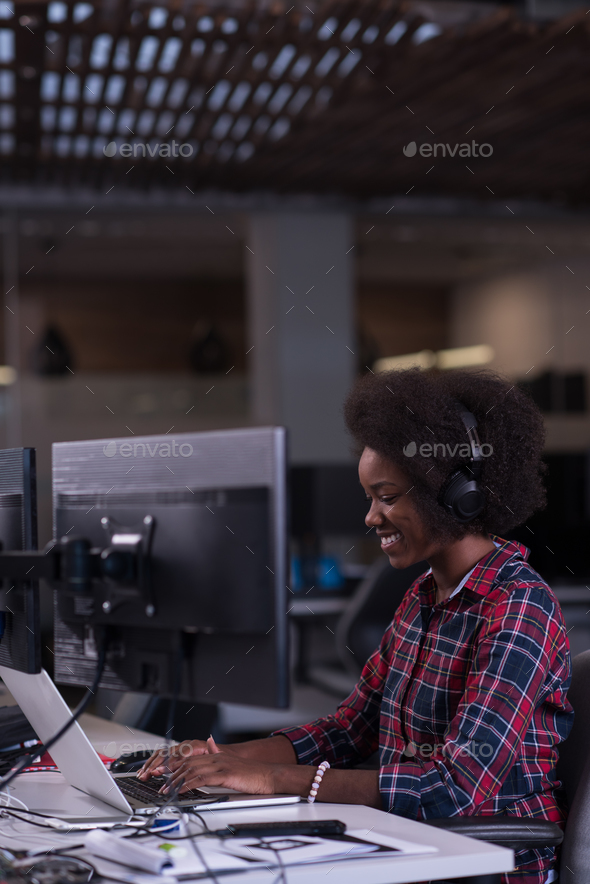 portrait of a young successful African-American woman in modern - Stock Photo - Images