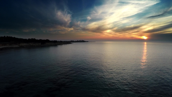 Aerial Sunrise Over The Sea