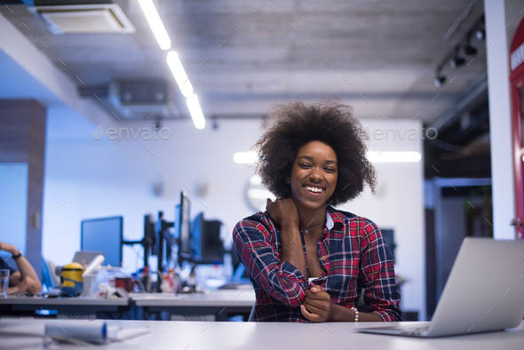 portrait of a young successful African-American woman in modern - Stock Photo - Images