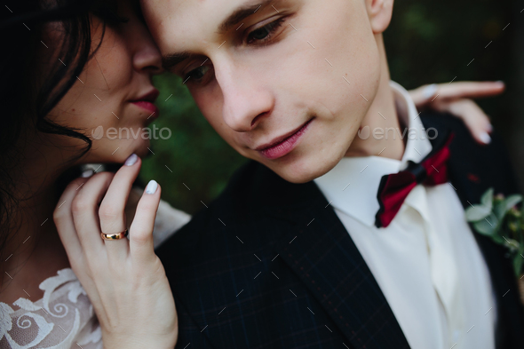 Bridal couple close to each other - Stock Photo - Images