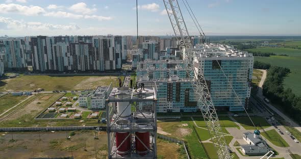 Workers on the Top Installing Chimney Pipe alt