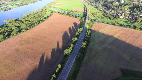 Aerial Landcape Of River In Green Meadows