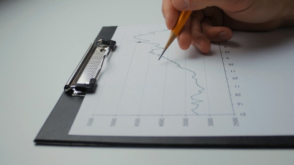 Businessman Developing a Business Project And Analyzing Market Data Information. alt