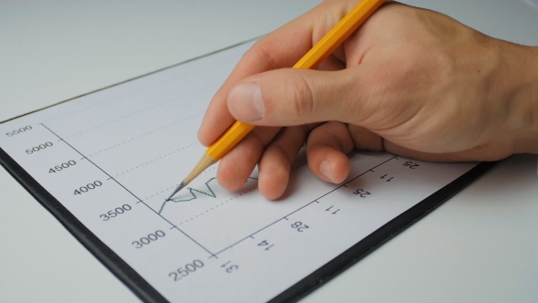 Businessman Developing a Business Project And Analyzing Market Data Information. alt