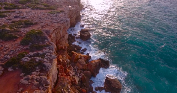 Beautiful Seashore With Clifs At Sunset