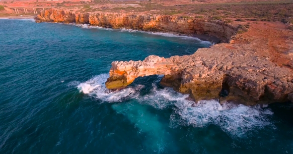 Beautiful Seashore With Clifs At Sunset