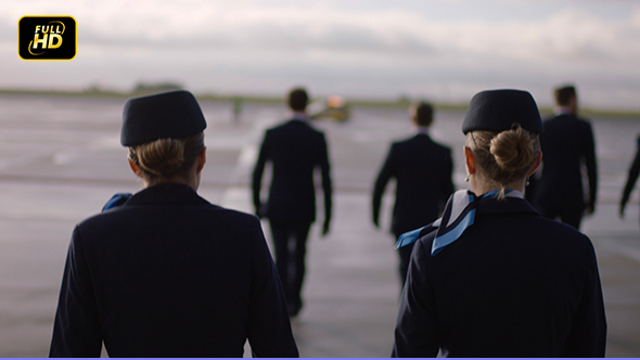 Cabin Crew Walking To Plane alt