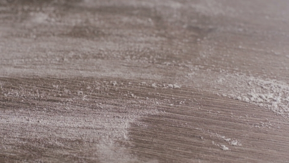 Scattered Dry Flour On a Kitchen Counter Top alt