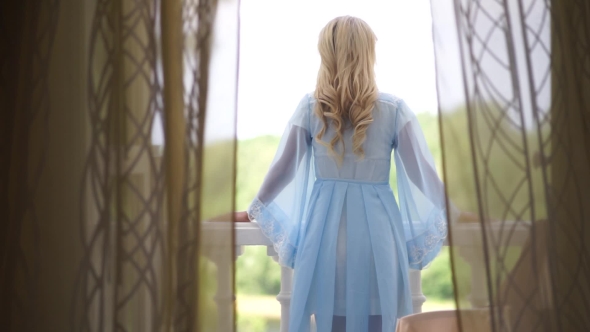 Bride In Blue Gown On The Balcony Of The Russian Estate