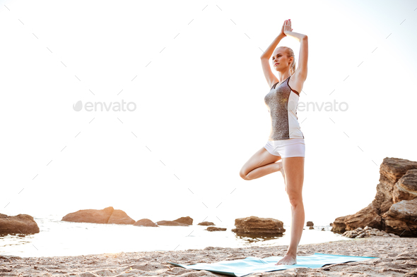Best Yoga instructor standing on one leg in tree pose Illustration download  in PNG & Vector format