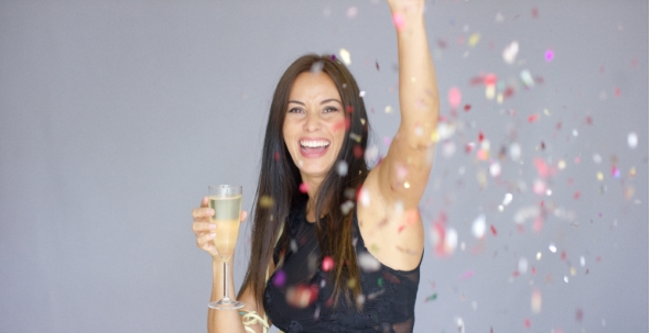 Vivacious Woman Having Fun At a New Year Party alt