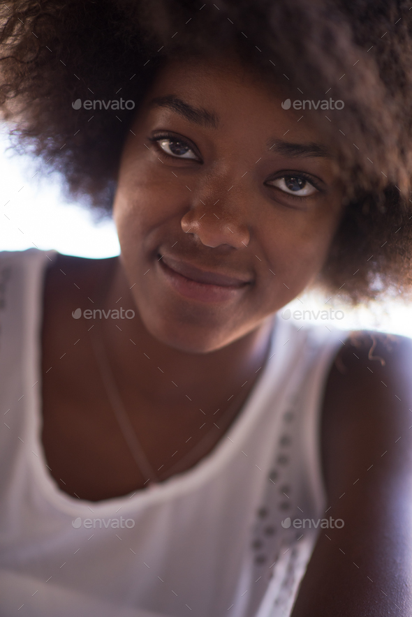 Close up portrait of a beautiful young african american woman sm - Stock Photo - Images