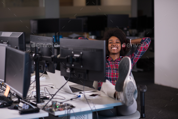 portrait of a young successful African-American woman in modern - Stock Photo - Images