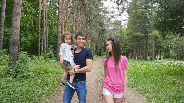 Happy Family On The Walk In Forest alt
