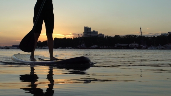 Beautiful Woman On Stand Up Paddle Board alt