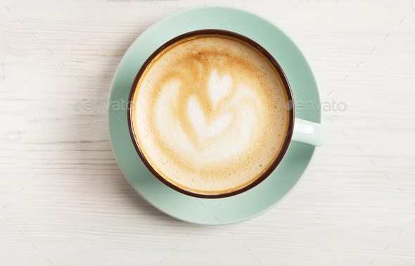 distrikt Følelse kapok Cappuccino foam, coffee cup top view on white wood background Stock Photo  by Prostock-studio