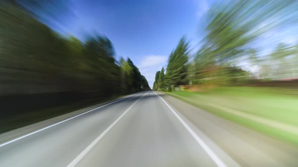 4K Point of View Hyperlapse Time-lapse of Car Driving Through Country Road. alt