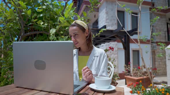 Gimbal Footage Dolly Close Up Beautiful Woman Drinking Coffee Enjoying Using Laptop Online Internet alt