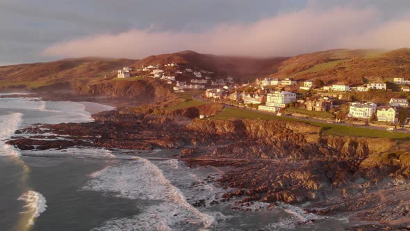 Aerial View Woolacombe Village Sea Rocky Coast, Clouds Sitting Over Hills, Winter/Spring Sunse