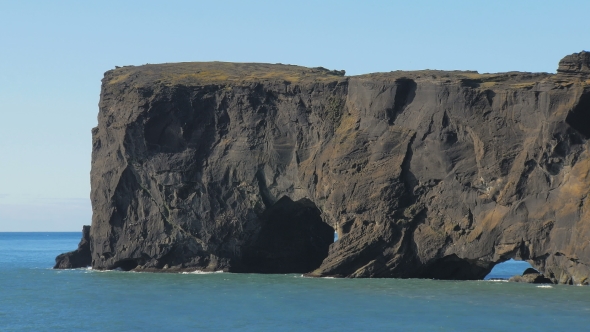 Dyrholaey Cape In Sunny Weather, Bright Blue And Calm Ocean