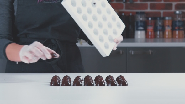 Confectioner Chocolatiers Checks Ready Chocolates.