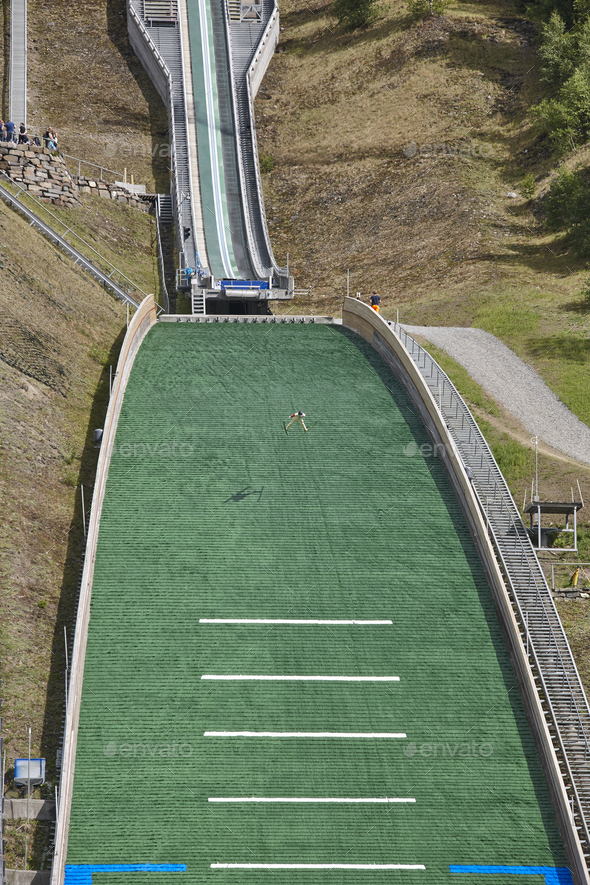 Ski jump. Artificial track. Sport background. Norwegian summer. Vertical