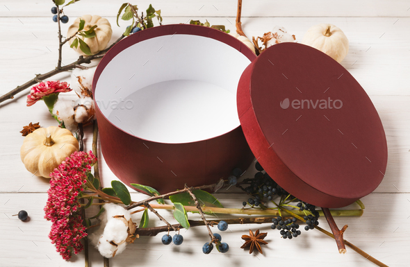 Empty present box with autumn decorations flowers background - Stock Photo - Images
