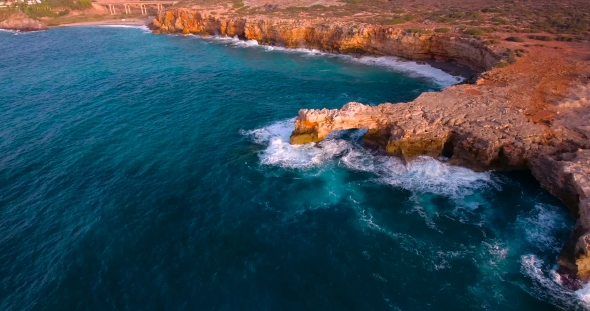 Beautiful Seashore With Clifs At Sunset