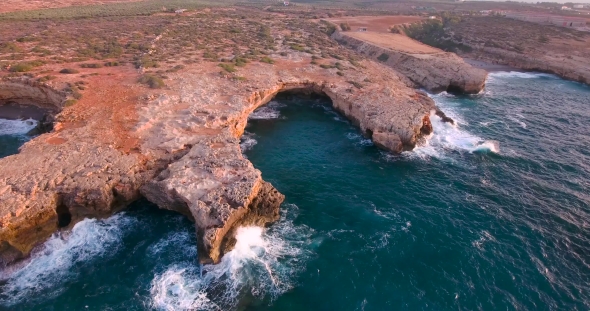 Beautiful Seashore With Clifs At Sunset