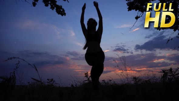 Silhouette Female Girl do Yoga Against Pink