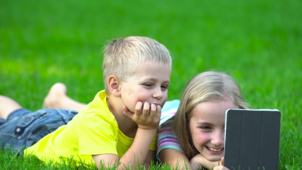 Children With Smart Phone Ooutside