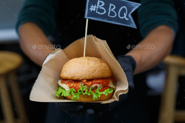 Street fast food, hamburger with bbq grilled steak