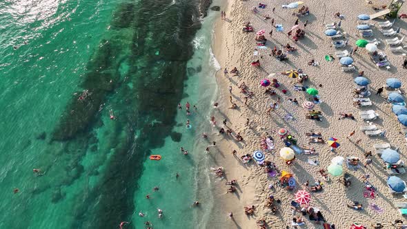 People swim in the azure sea aerial view 4 K Turkey Alanya alt