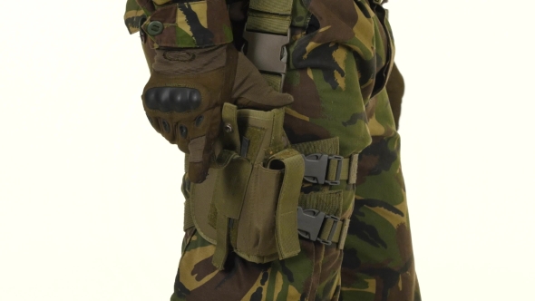 Soldier Put The Gun In The Holster. White Backgraund alt