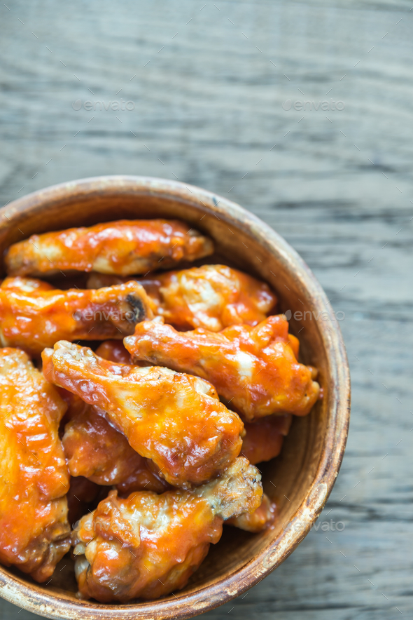 Bowl of buffalo chicken wings - Stock Photo - Images