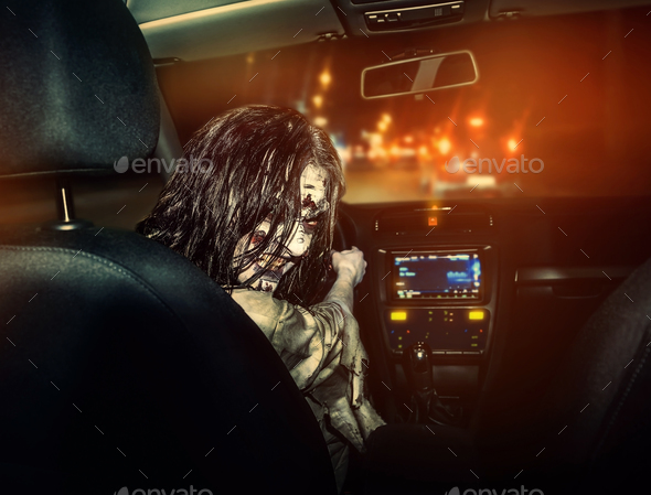 Undead girl with bloody face rides in the car