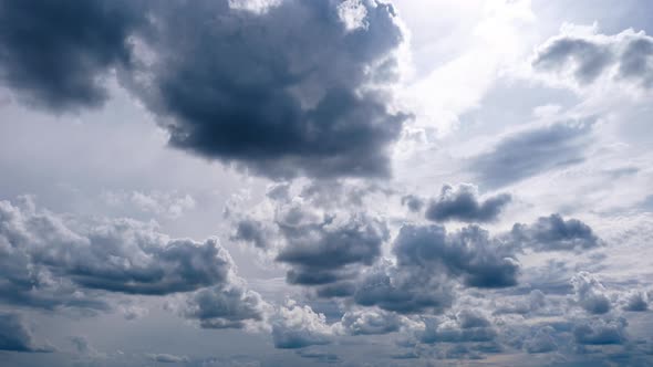 Timelapse of Gray Cumulus Clouds Moves in Blue Dramatic Sky Cirrus Cloud Space alt