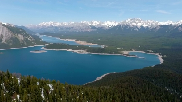 Aerial View Of Blue Lakes In The Snow Capped Rocky Mountains