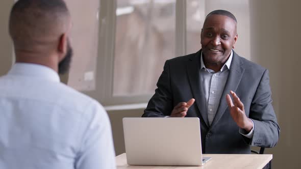 Mature Old Aged African American Boss Leader Business Man Agent Bank Manager Explain Advises Talking alt