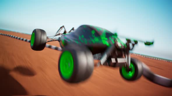 RC Car race on the sandy track. Loopable animation of a miniature model of buggy alt