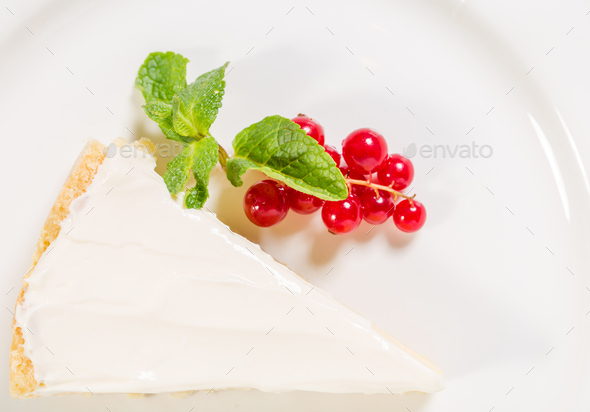Lemon cheesecake with mint and red currant. - Stock Photo - Images