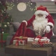 Santa Claus Putting Gift Boxes in Red Sack - VideoHive Item for Sale