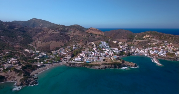 Flying Above Town By Seashore