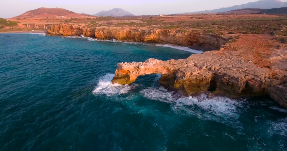 Beautiful Seashore With Clifs At Sunset