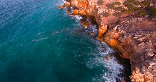 Beautiful Seashore With Clifs At Sunset