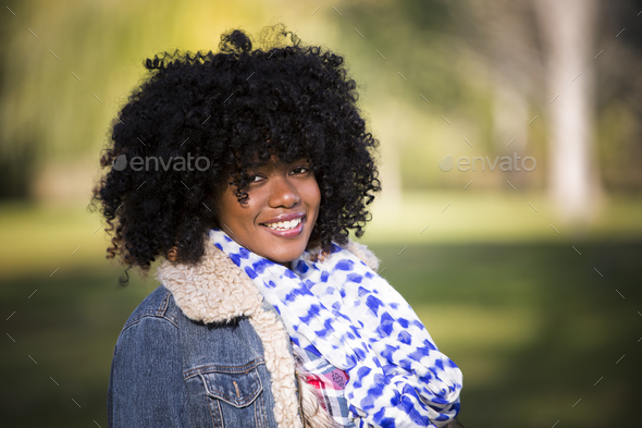 ethnic woman outdoors in the fall - Stock Photo - Images