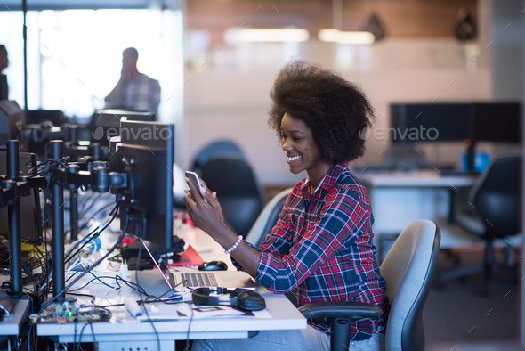 young black woman at her workplace in modern office