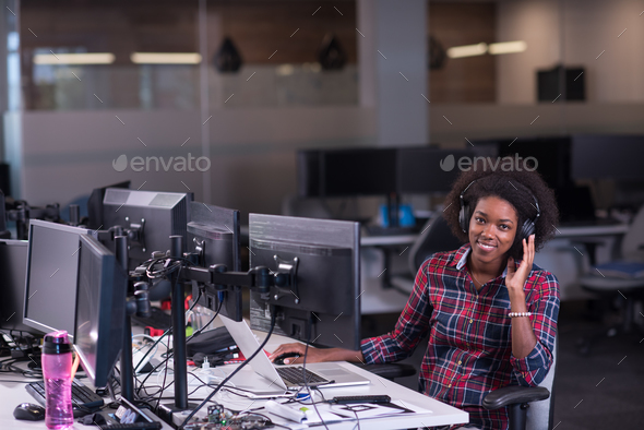 young black woman at her workplace in modern office African-Ame