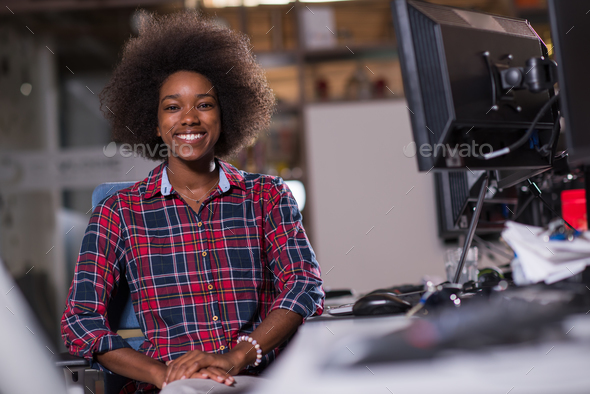 young black woman at her workplace in modern office